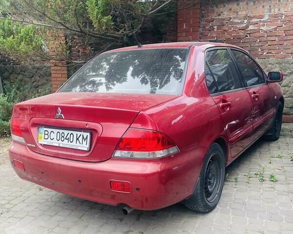 Червоний Міцубісі Lancer, об'ємом двигуна 1.58 л та пробігом 132 тис. км за 5300 $, фото 25 на Automoto.ua