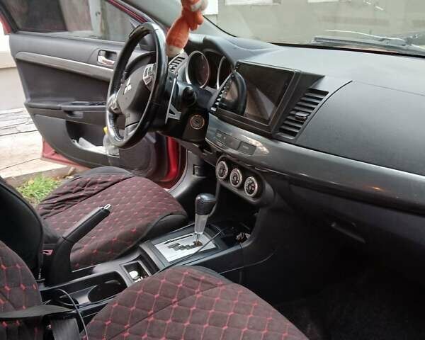 Червоний Міцубісі Lancer, об'ємом двигуна 2 л та пробігом 228 тис. км за 6200 $, фото 12 на Automoto.ua