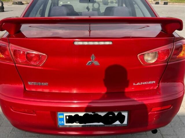 Мицубиси Лансер 2009 в Львове на Automoto.ua Красный Мицубиси Лансер, объемом двигателя 1.5 л и пробегом 202 тыс. км за 5800 $, фото 7 на Automoto.ua