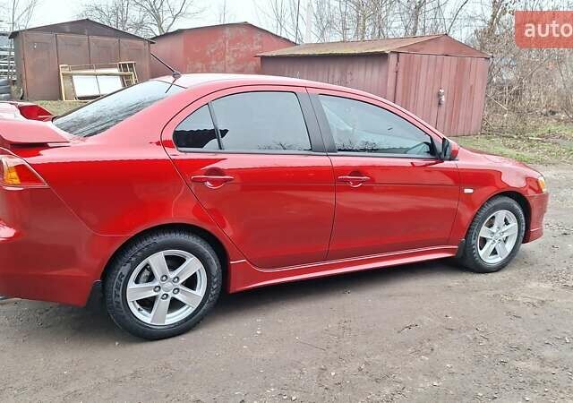 Красный Мицубиси Лансер, объемом двигателя 2 л и пробегом 120 тыс. км за 7800 $, фото 20 на Automoto.ua