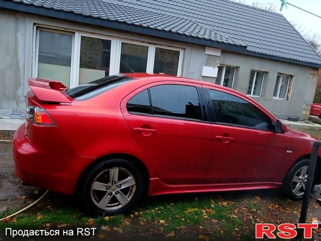Червоний Міцубісі Lancer, об'ємом двигуна 2 л та пробігом 228 тис. км за 6500 $, фото 4 на Automoto.ua