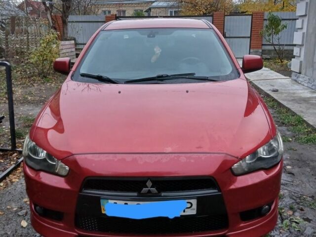 Червоний Міцубісі Lancer, об'ємом двигуна 2 л та пробігом 2 тис. км за 6200 $, фото 1 на Automoto.ua