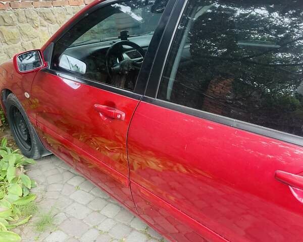 Червоний Міцубісі Lancer, об'ємом двигуна 1.58 л та пробігом 132 тис. км за 5300 $, фото 26 на Automoto.ua