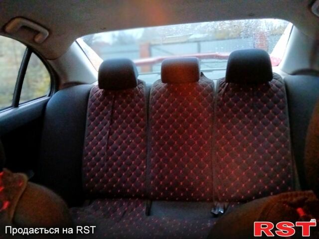 Червоний Міцубісі Lancer, об'ємом двигуна 2 л та пробігом 228 тис. км за 6500 $, фото 1 на Automoto.ua