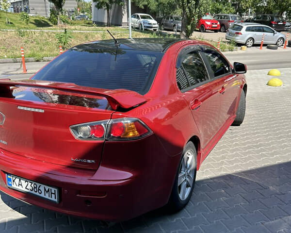 Мицубиси Лансер 2009 в Киеве на Automoto.ua Красный Мицубиси Лансер, объемом двигателя 2 л и пробегом 251 тыс. км за 6999 $, фото 1 на Automoto.ua