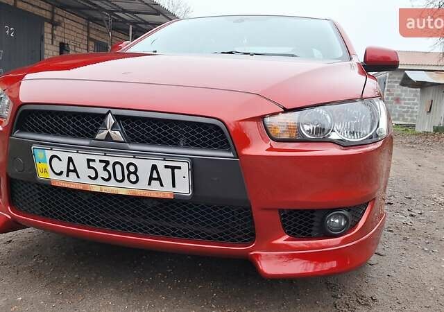 Красный Мицубиси Лансер, объемом двигателя 2 л и пробегом 120 тыс. км за 7800 $, фото 8 на Automoto.ua