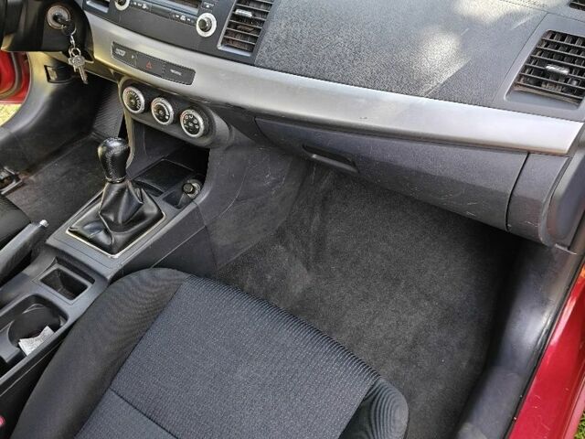 Червоний Міцубісі Lancer, об'ємом двигуна 0 л та пробігом 144 тис. км за 5600 $, фото 5 на Automoto.ua