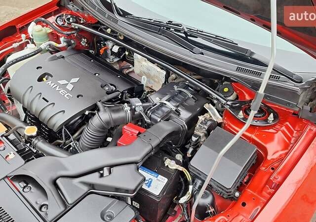 Красный Мицубиси Лансер, объемом двигателя 2 л и пробегом 120 тыс. км за 7800 $, фото 34 на Automoto.ua