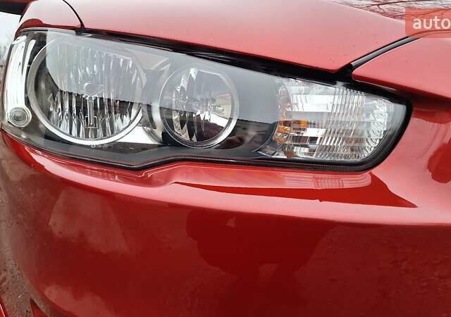 Красный Мицубиси Лансер, объемом двигателя 2 л и пробегом 120 тыс. км за 7800 $, фото 10 на Automoto.ua