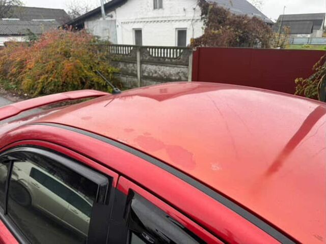 Червоний Міцубісі Lancer, об'ємом двигуна 2 л та пробігом 240 тис. км за 4900 $, фото 7 на Automoto.ua