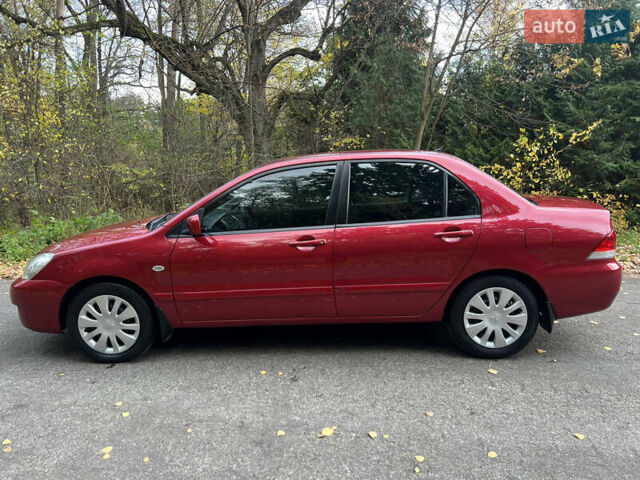 Міцубісі Lancer 2009 у Вінниці на Automoto.ua Червоний Міцубісі Lancer, об'ємом двигуна 1.58 л та пробігом 133 тис. км за 6750 $, фото 12 на Automoto.ua