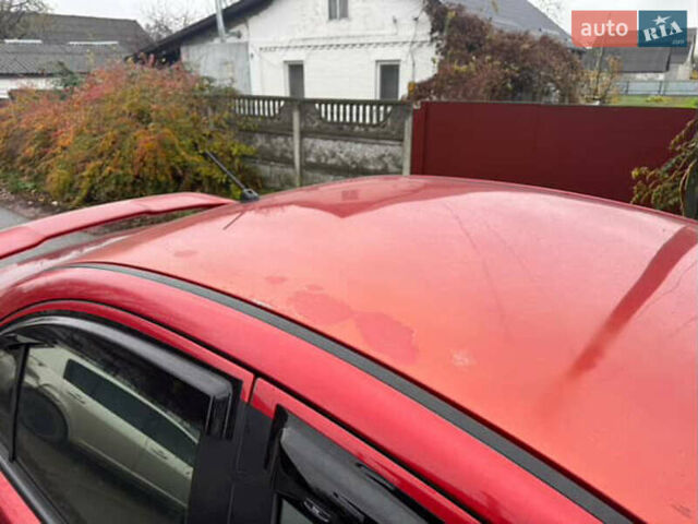 Красный Мицубиси Лансер, объемом двигателя 2 л и пробегом 246 тыс. км за 4900 $, фото 4 на Automoto.ua