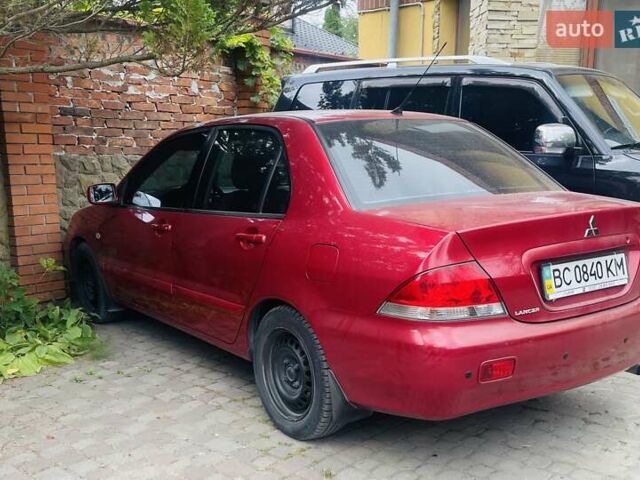 Червоний Міцубісі Lancer, об'ємом двигуна 1.58 л та пробігом 132 тис. км за 5300 $, фото 24 на Automoto.ua