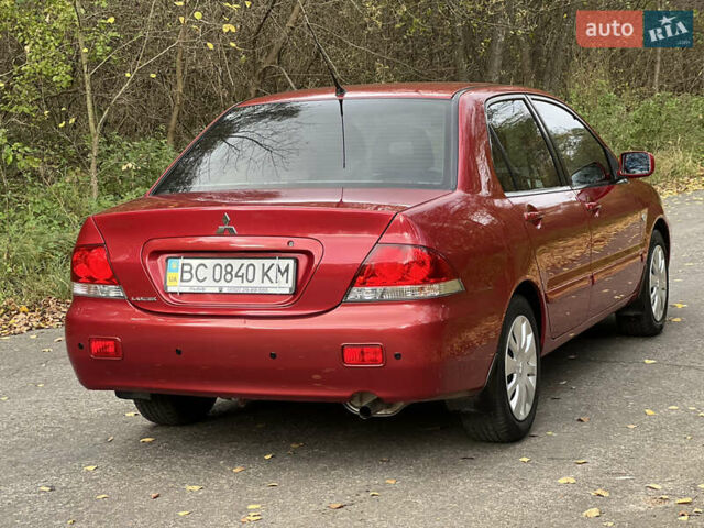 Міцубісі Lancer 2009 у Вінниці на Automoto.ua Червоний Міцубісі Lancer, об'ємом двигуна 1.58 л та пробігом 133 тис. км за 6750 $, фото 9 на Automoto.ua