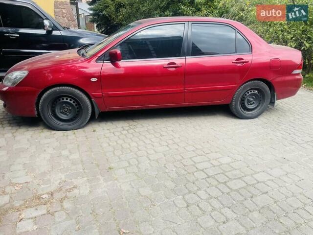 Червоний Міцубісі Lancer, об'ємом двигуна 1.58 л та пробігом 132 тис. км за 5300 $, фото 14 на Automoto.ua