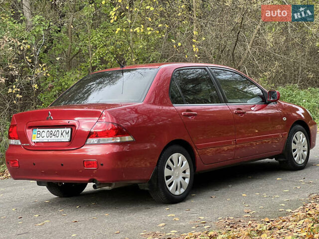 Міцубісі Lancer 2009 у Вінниці на Automoto.ua Червоний Міцубісі Lancer, об'ємом двигуна 1.58 л та пробігом 133 тис. км за 6750 $, фото 8 на Automoto.ua