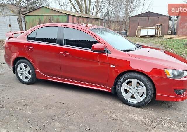 Красный Мицубиси Лансер, объемом двигателя 2 л и пробегом 120 тыс. км за 7800 $, фото 19 на Automoto.ua