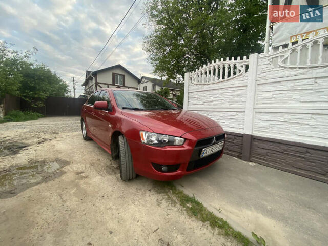 Красный Мицубиси Лансер, объемом двигателя 2 л и пробегом 225 тыс. км за 7200 $, фото 8 на Automoto.ua