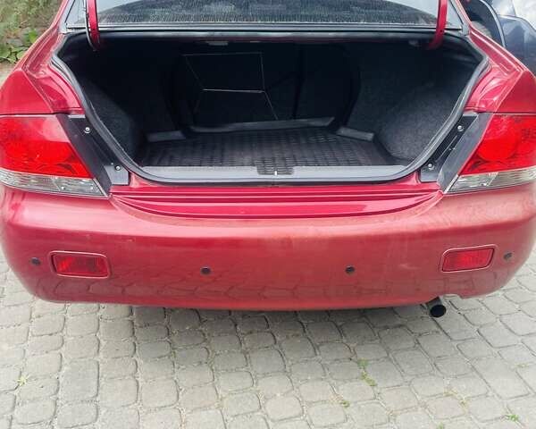 Червоний Міцубісі Lancer, об'ємом двигуна 1.58 л та пробігом 132 тис. км за 5300 $, фото 15 на Automoto.ua