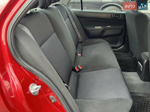 Міцубісі Lancer 2009 у Вінниці на Automoto.ua Червоний Міцубісі Lancer, об'ємом двигуна 1.58 л та пробігом 133 тис. км за 6750 $, фото 31 на Automoto.ua