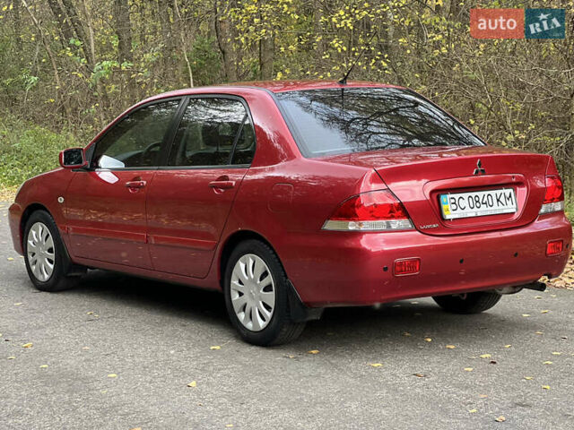 Міцубісі Lancer 2009 у Вінниці на Automoto.ua Червоний Міцубісі Lancer, об'ємом двигуна 1.58 л та пробігом 133 тис. км за 6750 $, фото 11 на Automoto.ua