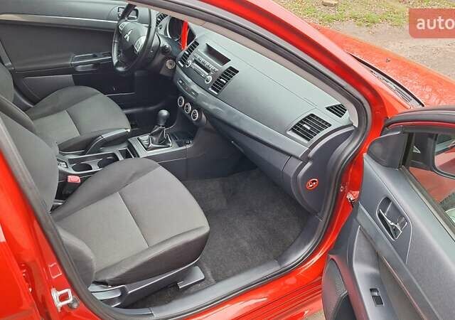 Красный Мицубиси Лансер, объемом двигателя 2 л и пробегом 120 тыс. км за 7800 $, фото 30 на Automoto.ua