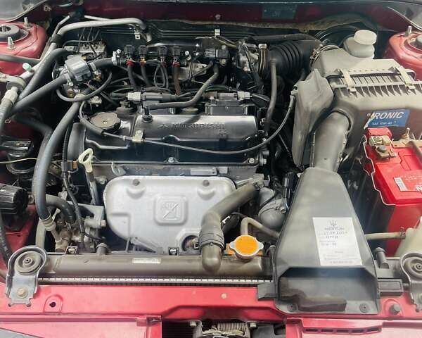 Червоний Міцубісі Lancer, об'ємом двигуна 1.58 л та пробігом 132 тис. км за 5300 $, фото 2 на Automoto.ua