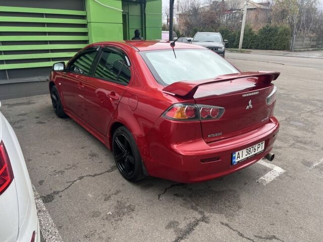 Червоний Міцубісі Lancer, об'ємом двигуна 2 л та пробігом 240 тис. км за 4900 $, фото 3 на Automoto.ua