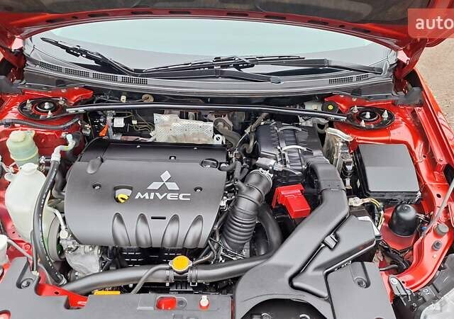 Красный Мицубиси Лансер, объемом двигателя 2 л и пробегом 120 тыс. км за 7800 $, фото 32 на Automoto.ua