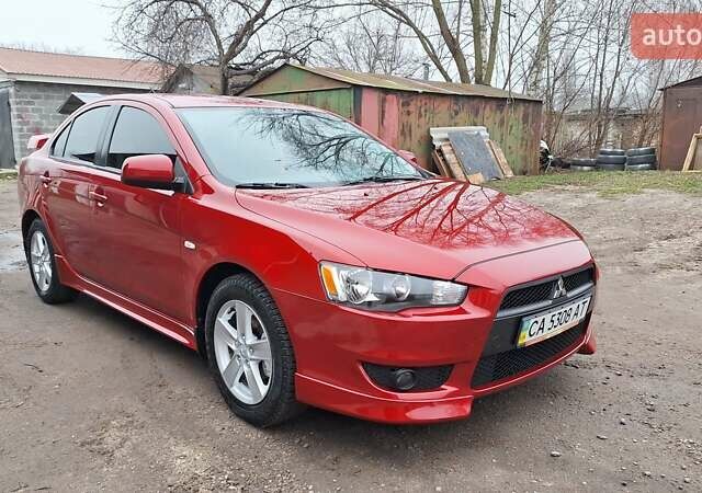 Красный Мицубиси Лансер, объемом двигателя 2 л и пробегом 120 тыс. км за 7800 $, фото 6 на Automoto.ua