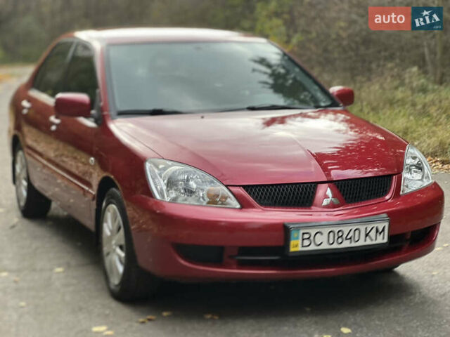 Міцубісі Lancer 2009 у Вінниці на Automoto.ua Червоний Міцубісі Lancer, об'ємом двигуна 1.58 л та пробігом 133 тис. км за 6750 $, фото 2 на Automoto.ua