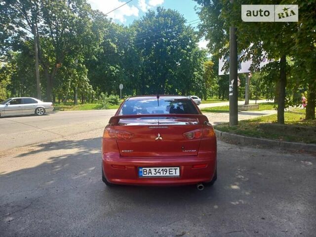 Червоний Міцубісі Lancer, об'ємом двигуна 2 л та пробігом 95 тис. км за 7200 $, фото 2 на Automoto.ua