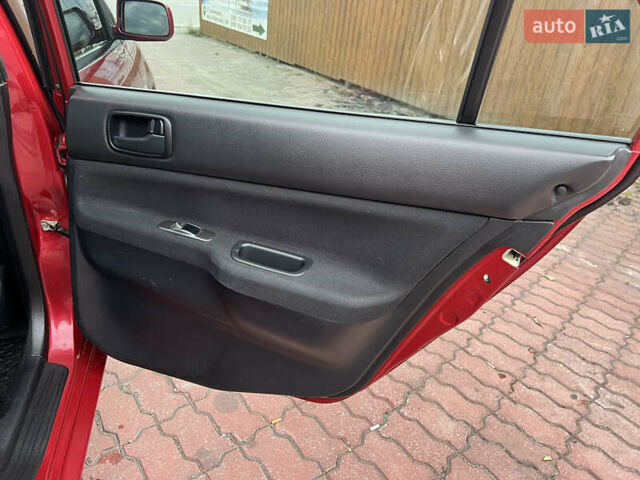 Міцубісі Lancer 2009 у Вінниці на Automoto.ua Червоний Міцубісі Lancer, об'ємом двигуна 1.58 л та пробігом 133 тис. км за 6750 $, фото 25 на Automoto.ua