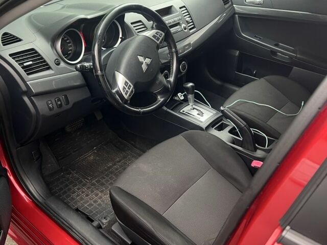 Червоний Міцубісі Lancer, об'ємом двигуна 2 л та пробігом 240 тис. км за 4900 $, фото 6 на Automoto.ua