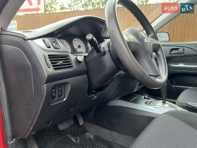 Міцубісі Lancer 2009 у Вінниці на Automoto.ua Червоний Міцубісі Lancer, об'ємом двигуна 1.58 л та пробігом 133 тис. км за 6750 $, фото 20 на Automoto.ua