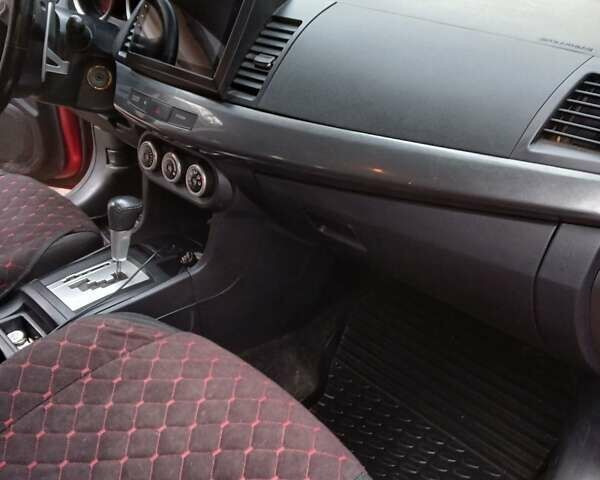 Червоний Міцубісі Lancer, об'ємом двигуна 2 л та пробігом 228 тис. км за 6200 $, фото 9 на Automoto.ua