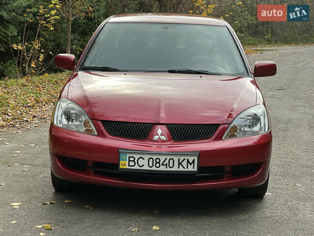 Міцубісі Lancer 2009 у Вінниці на Automoto.ua Червоний Міцубісі Lancer, об'ємом двигуна 1.58 л та пробігом 133 тис. км за 6750 $, фото 1 на Automoto.ua