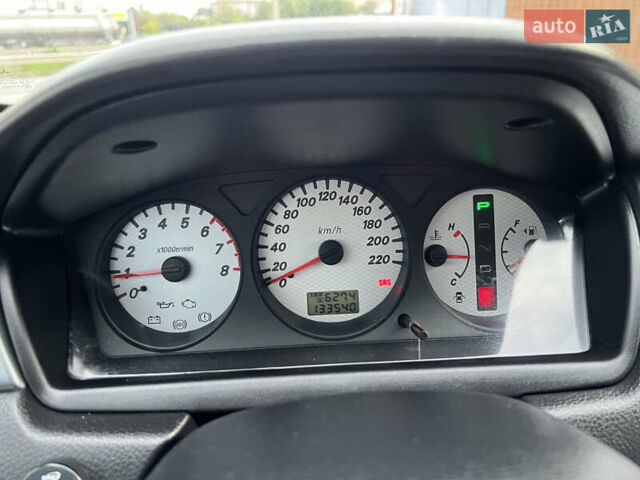 Міцубісі Lancer 2009 у Вінниці на Automoto.ua Червоний Міцубісі Lancer, об'ємом двигуна 1.58 л та пробігом 133 тис. км за 6750 $, фото 44 на Automoto.ua