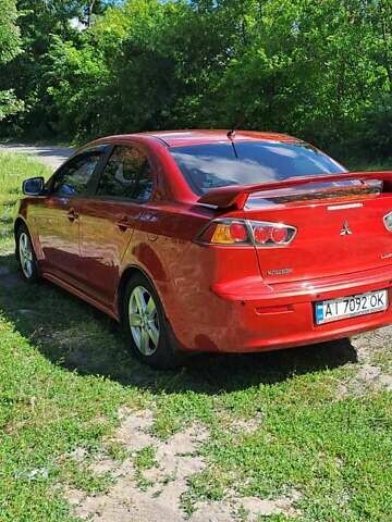 Червоний Міцубісі Lancer, об'ємом двигуна 2 л та пробігом 197 тис. км за 7300 $, фото 2 на Automoto.ua