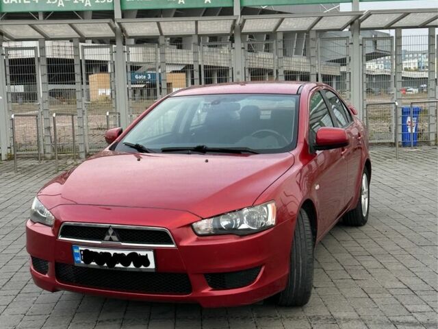 Мицубиси Лансер 2009 в Львове на Automoto.ua Красный Мицубиси Лансер, объемом двигателя 1.5 л и пробегом 202 тыс. км за 5800 $, фото 2 на Automoto.ua