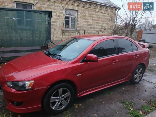 Червоний Міцубісі Lancer, об'ємом двигуна 2 л та пробігом 228 тис. км за 6200 $, фото 7 на Automoto.ua