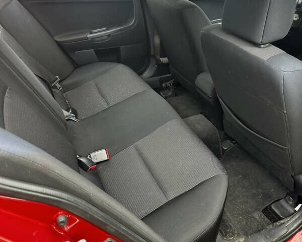 Красный Мицубиси Лансер, объемом двигателя 2 л и пробегом 92 тыс. км за 6500 $, фото 13 на Automoto.ua