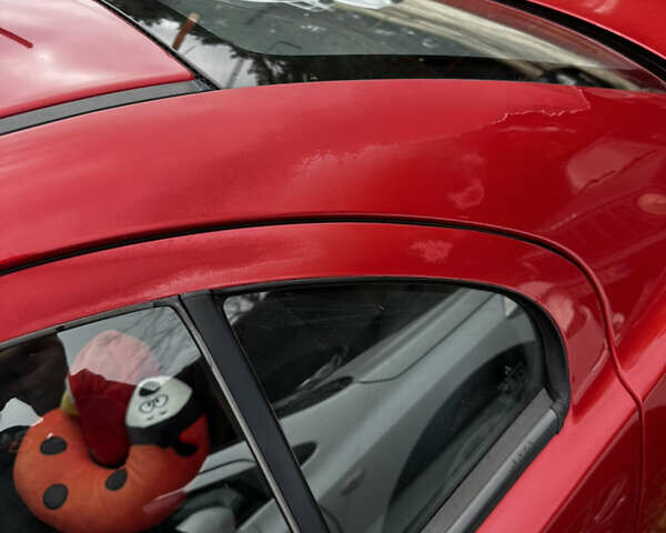 Красный Мицубиси Лансер, объемом двигателя 2 л и пробегом 92 тыс. км за 6500 $, фото 8 на Automoto.ua