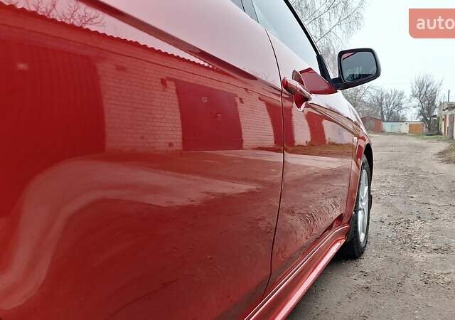 Красный Мицубиси Лансер, объемом двигателя 2 л и пробегом 120 тыс. км за 7800 $, фото 17 на Automoto.ua