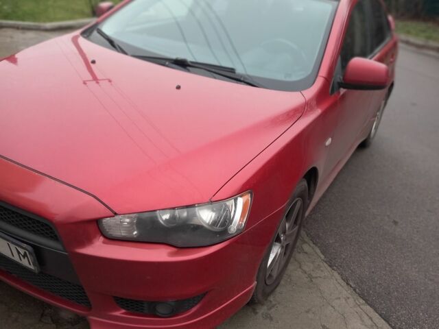 Червоний Міцубісі Lancer, об'ємом двигуна 2 л та пробігом 250 тис. км за 6500 $, фото 2 на Automoto.ua