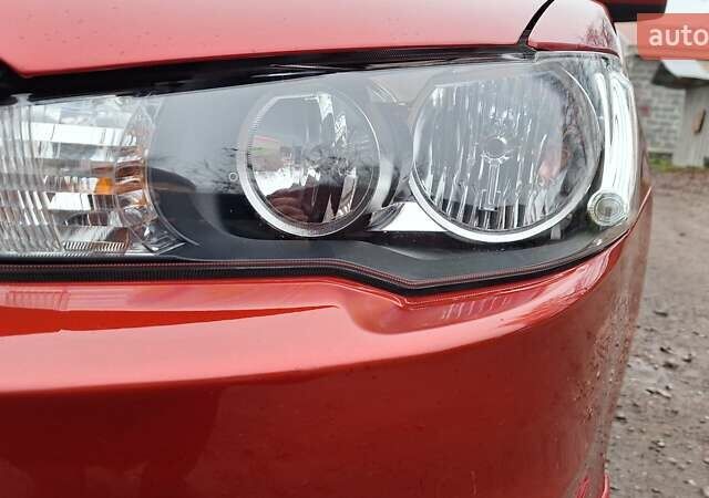 Красный Мицубиси Лансер, объемом двигателя 2 л и пробегом 120 тыс. км за 7800 $, фото 9 на Automoto.ua