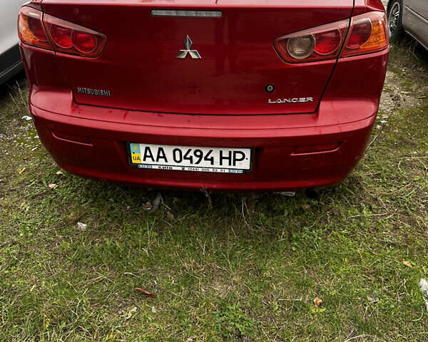 Красный Мицубиси Лансер, объемом двигателя 2 л и пробегом 92 тыс. км за 6500 $, фото 7 на Automoto.ua