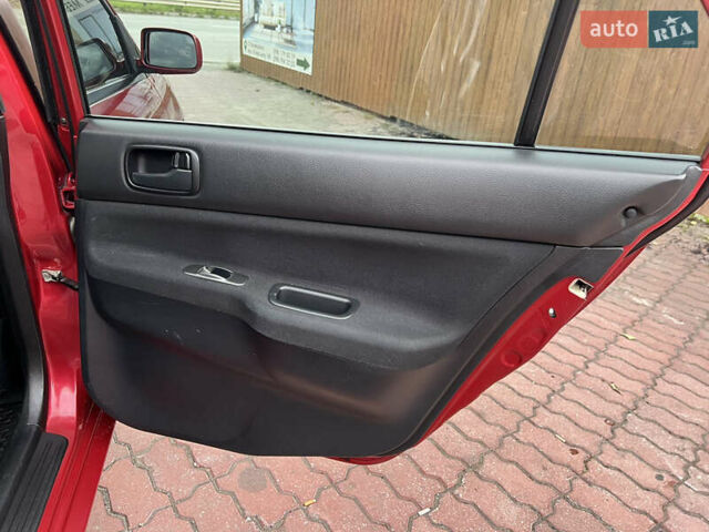 Міцубісі Lancer 2009 у Вінниці на Automoto.ua Червоний Міцубісі Lancer, об'ємом двигуна 1.58 л та пробігом 133 тис. км за 6750 $, фото 30 на Automoto.ua