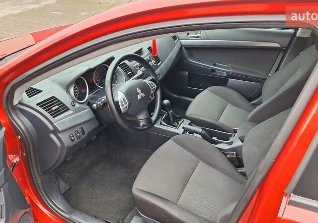 Красный Мицубиси Лансер, объемом двигателя 2 л и пробегом 120 тыс. км за 7800 $, фото 23 на Automoto.ua
