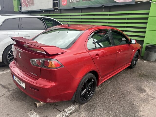 Червоний Міцубісі Lancer, об'ємом двигуна 2 л та пробігом 240 тис. км за 4900 $, фото 2 на Automoto.ua
